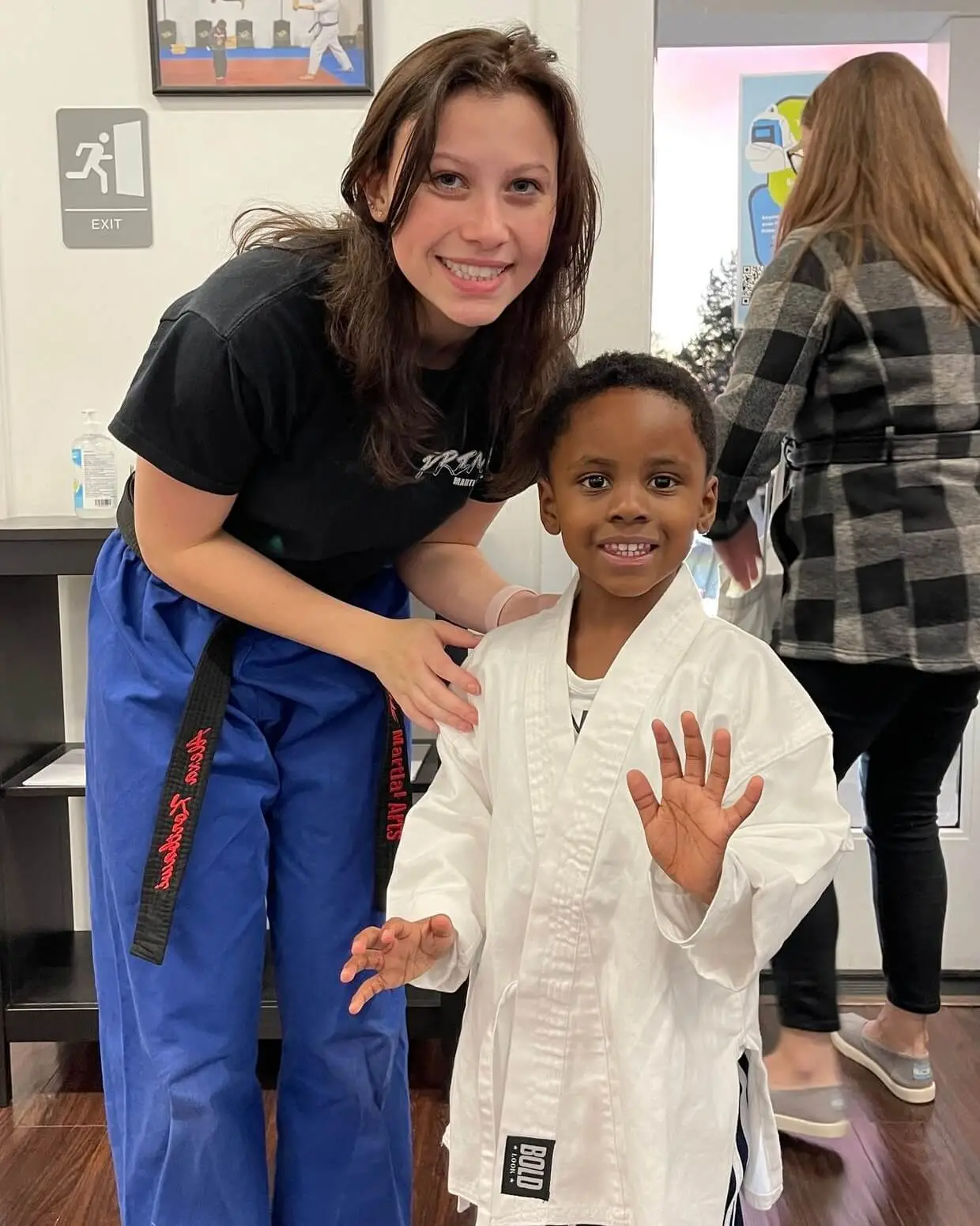 4 year old with martial arts instructor